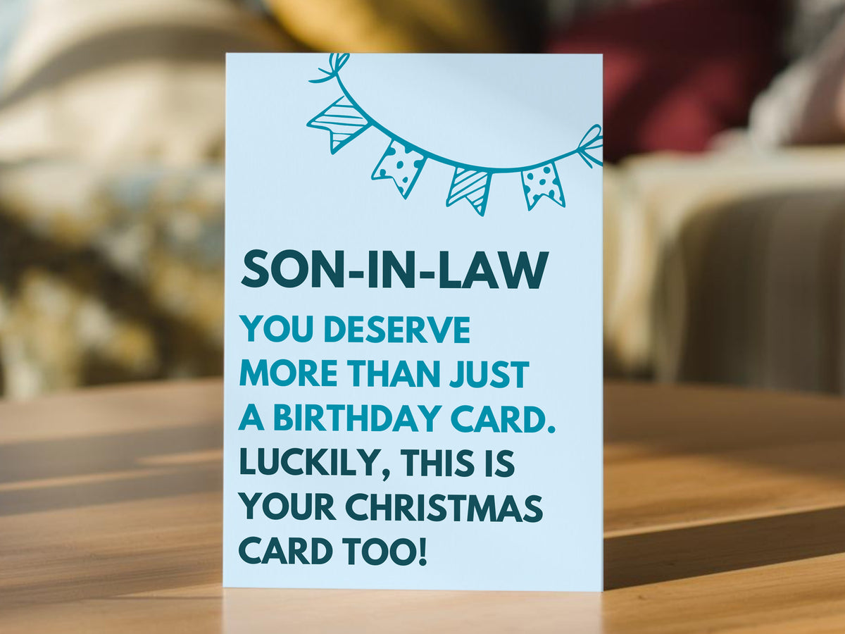 A light blue son-in-law birthday card with dark teal text and a bunting graphic. The card reads: 'SON-IN-LAW YOU DESERVE MORE THAN JUST A BIRTHDAY CARD.
