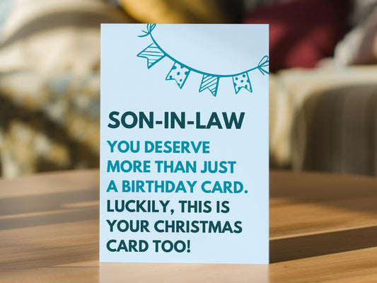 A light blue son-in-law birthday card with dark teal text and a bunting graphic. The card reads: 'SON-IN-LAW YOU DESERVE MORE THAN JUST A BIRTHDAY CARD.