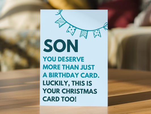 A light blue son birthday card. The card reads, 'SON YOU DESERVE MORE THAN JUST A BIRTHDAY CARD. LUCKILY THIS IS YOUR CHRISTMAS CARD TOO!"
